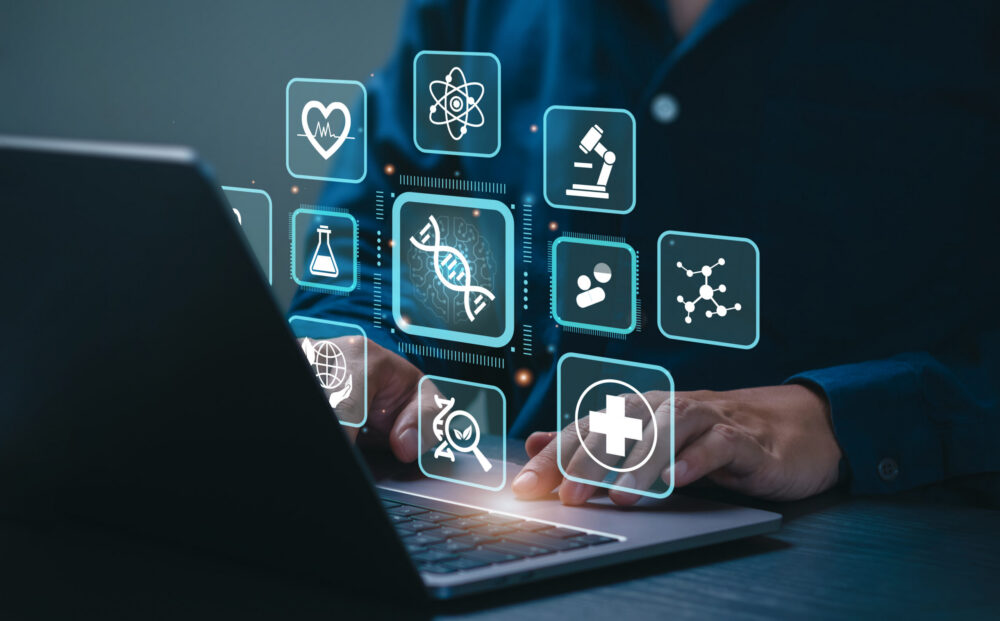 Biotechnology Concept: Businessman Uses a laptop on Biotechnology Icons representing digital health technology, Research, Development, Innovation, Advancing Smart Solutions from Digital Technology.